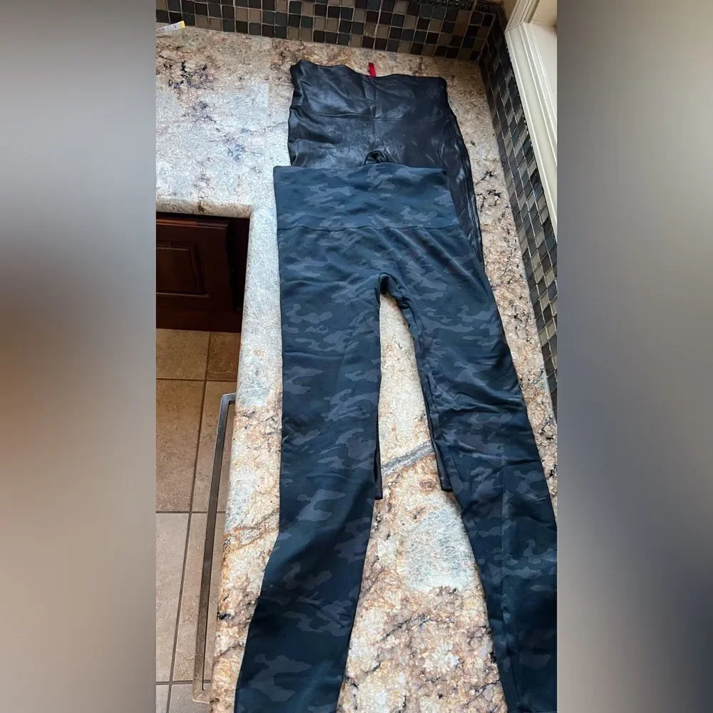 2 Spanx Black and Camouflage Leggings